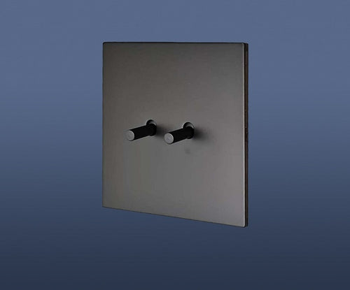 Load image into Gallery viewer, 2 Gang 2 Way Toggle Light Switch Brushed Brass / Matte Gold Toggle with Black Plate Finish Set Product
