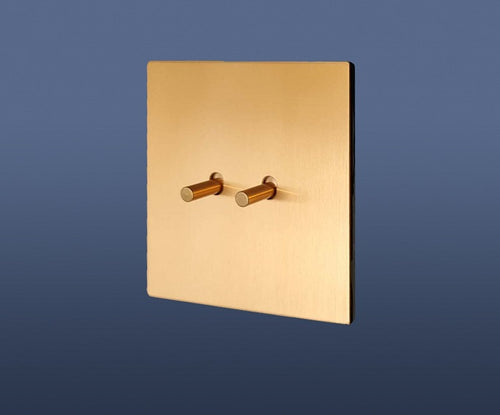 Load image into Gallery viewer, 2 Gang 2 Way Toggle Light Switch Brushed Brass / Matte Gold Toggle with Black Plate Finish Set Product
