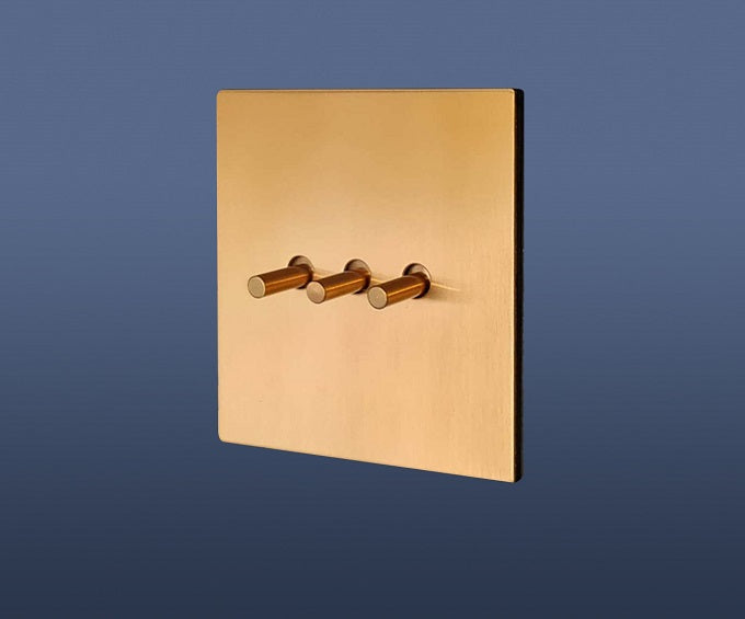 3 Gang 2 Way Toggle Light Switch Brass Gold Toggle with Matt Black Plate Finish Set Product